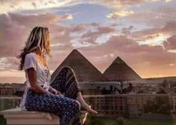 خلجات نبض القيثارة غربة في روح الوطن