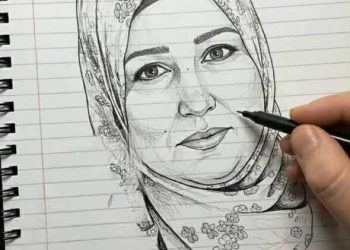 تتمايلُ الأزهارُ في أغصانها